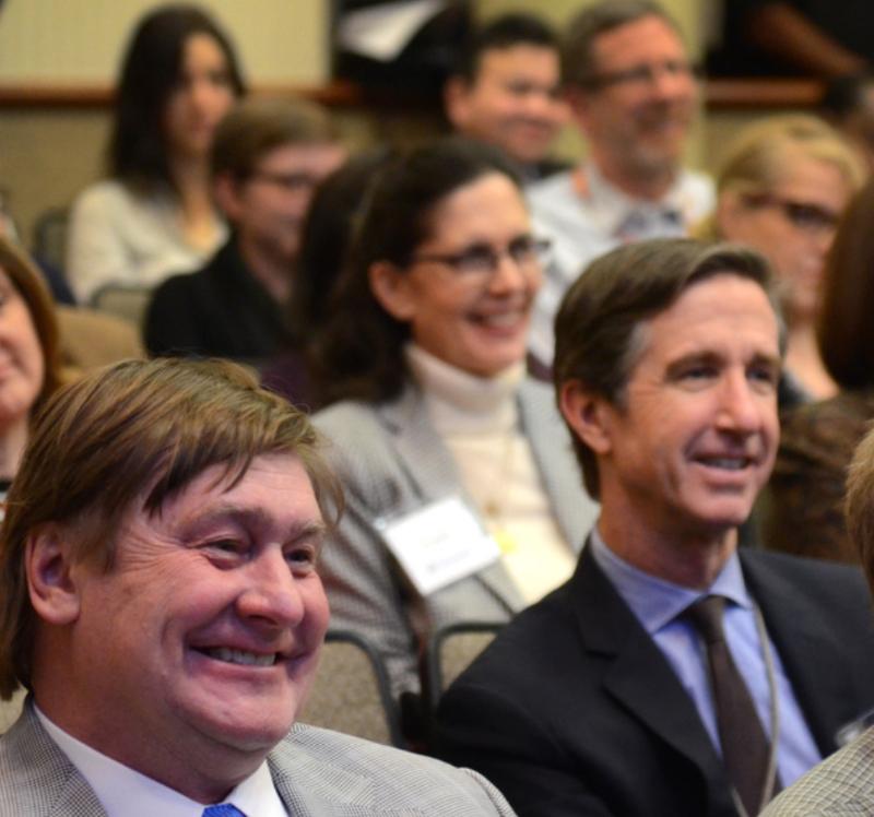 A shot of NACDD members smiling at a conference