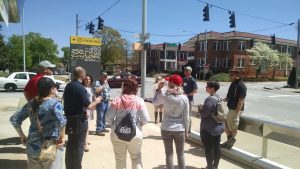 NACDD’s Third Annual Walkability Action Institute standing outside on a city sidewalk.