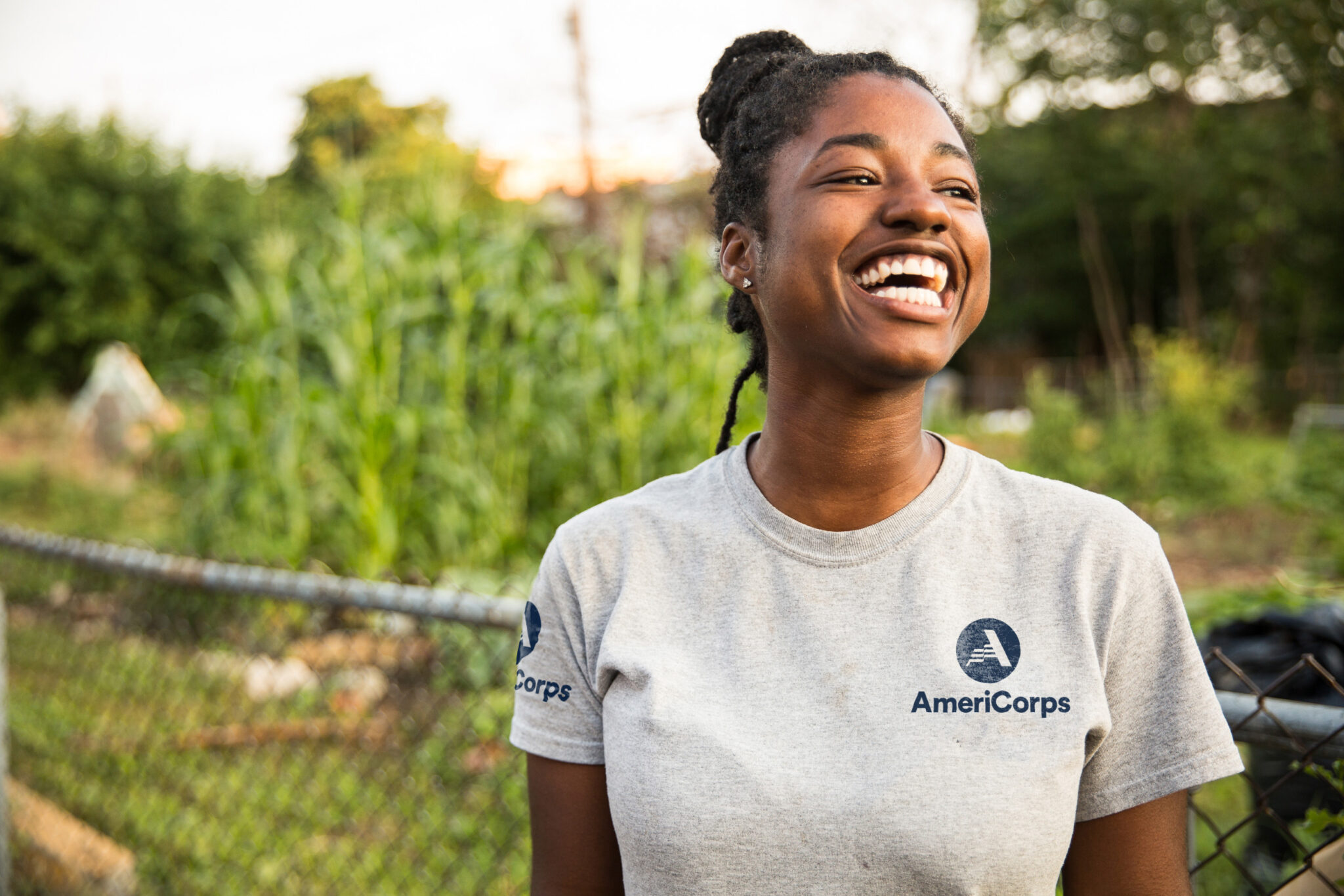 Americorps volunteer smiling